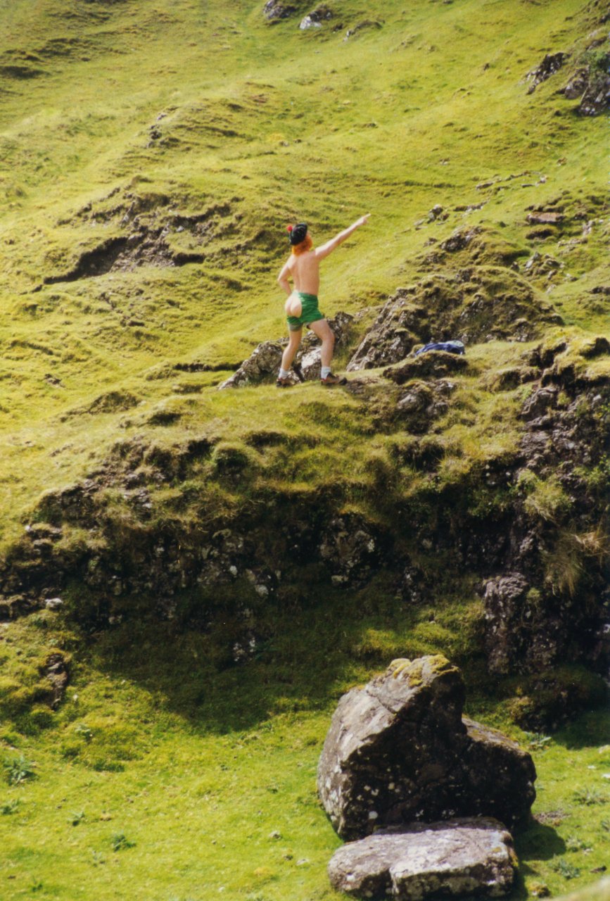 A-M Skye trip July 99- An American with bare butt and wig outfit- gracing the hillside